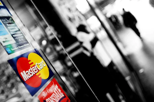 Mastercard sign on a shop window. RedOwl is backed by payments giant Mastercard